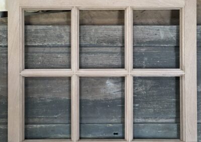 Wood window sash ready for glass to be inlaid.