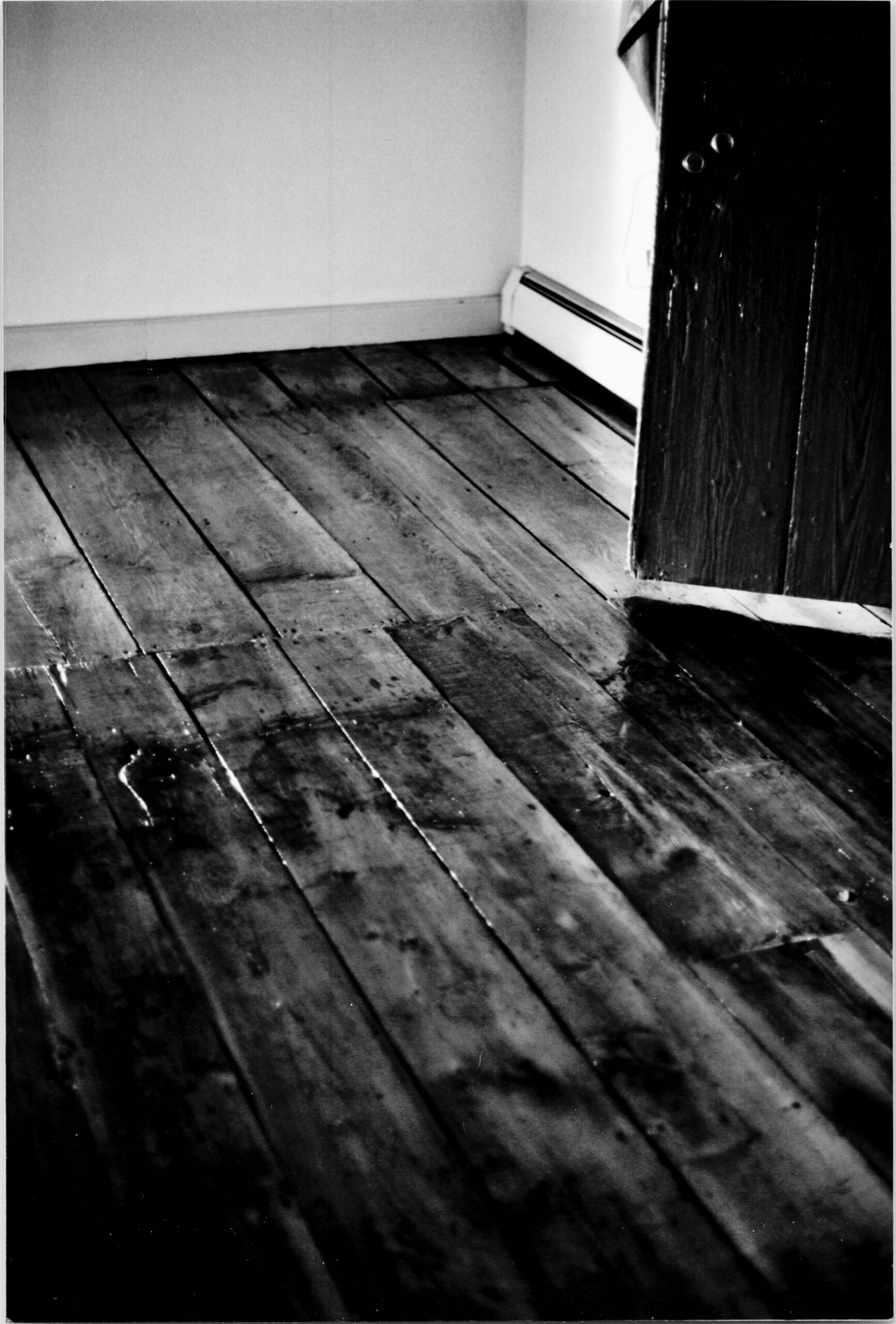 Old photo of 200 year old heart pine floor. That was planed and refinished by hand.