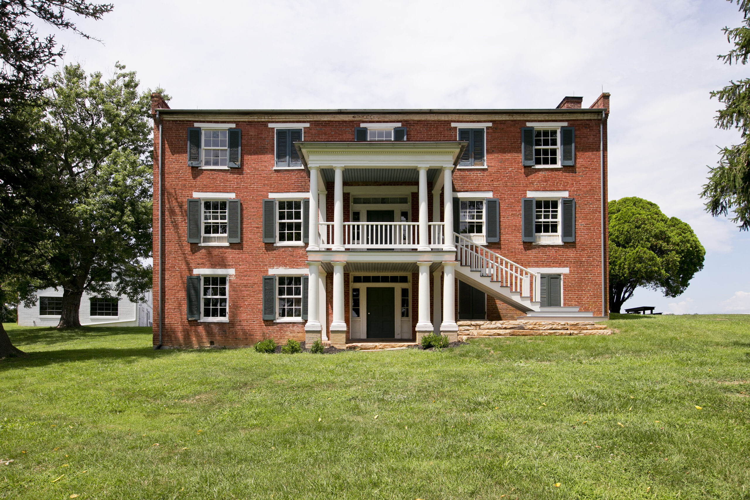Photo of a custom walnut porch restoration at the Pritchard-Grimm Farm at the Kernstown, Battlefield in Winchester, VA.